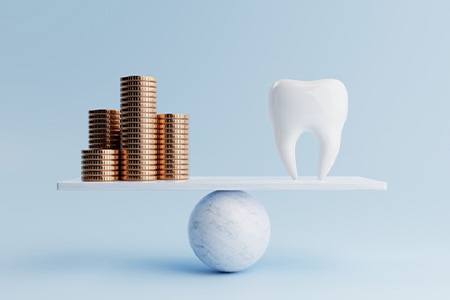 Illustration of coins balanced against tooth