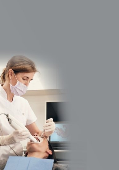 team member working on patient's teeth