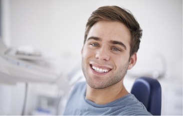 Man with flawless smile after cosmetic dentistry
