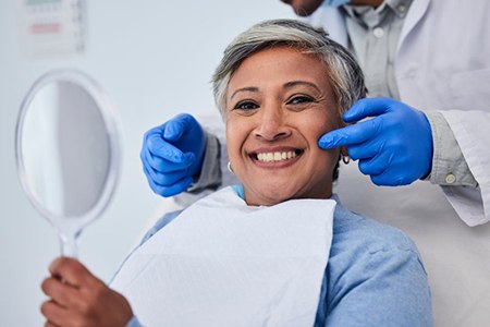 a patient smiling with bright teeth
