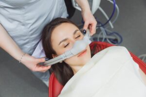 Patient receiving laughing gas.